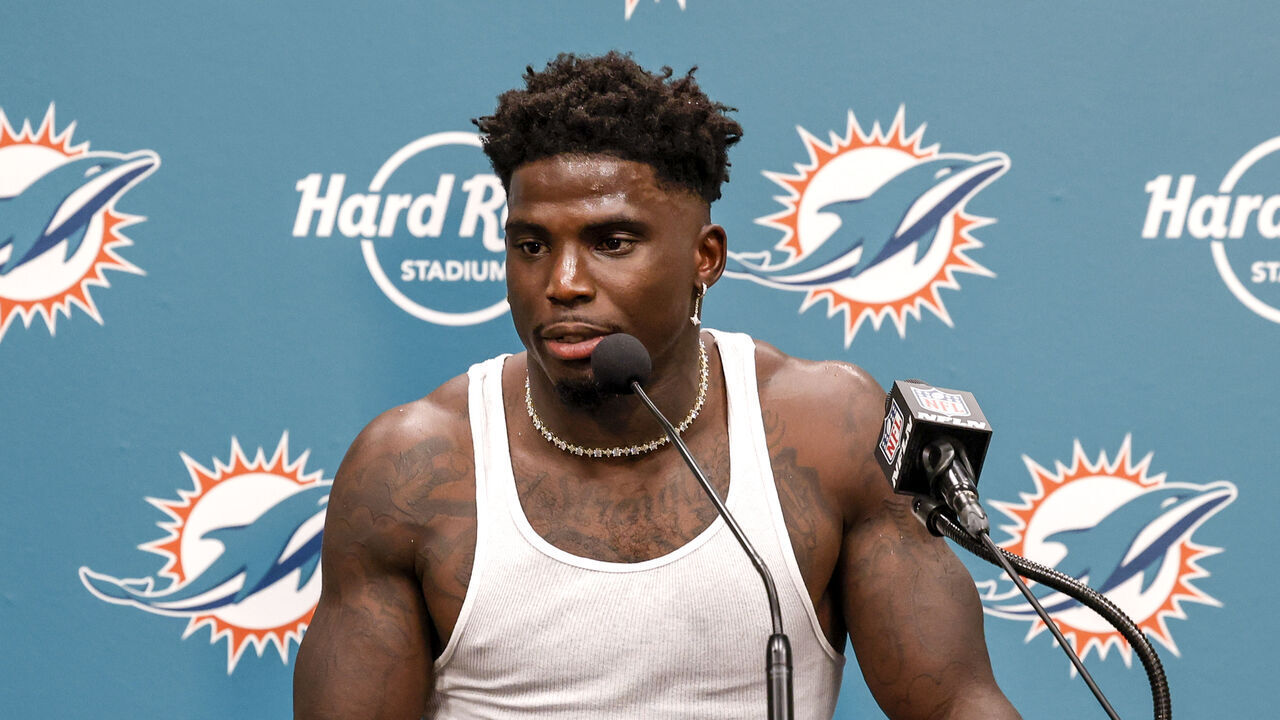 MIAMI GARDENS, FL - SEPTEMBER 8: Wide Receiver Tyreek Hill #10 of the Miami Dolphins addresses the media during the post-game press conference after playing the Jacksonville Jaguars at Hard Rock Stadium on September 8, 2024 in Miami Gardens, Florida. Hill was handcuffed and placed facedown on a street by police officers after he was stopped for a traffic violation near Hard Rock Stadium just hours before his team was to open the 2024 football season. The Dolphins defeated the Jaguars 20-17.