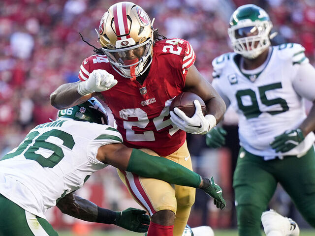 SANTA CLARA, CALIFORNIA - SEPTEMBER 09: Jordan Mason #24 of the San Francisco 49ers carries the ball against Chuck Clark #36 of the New York Jets during the first half at Levi's Stadium on September 09, 2024 in Santa Clara, California.