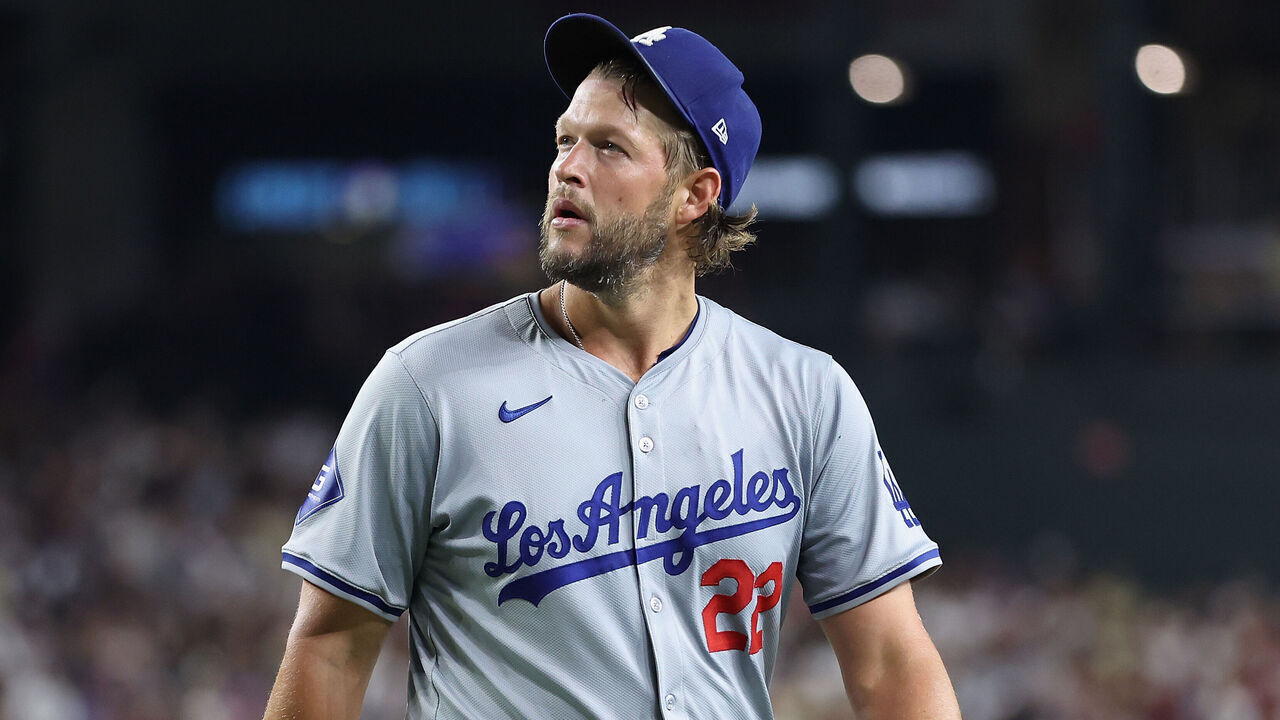 PHOENIX, ARIZONA - AUGUST 30: Starting pitcher Clayton Kershaw #22 of the Los Angeles Dodgers reacts after being removed during the second inning of the MLB game against the Arizona Diamondbacks at Chase Field on August 30, 2024 in Phoenix, Arizona.