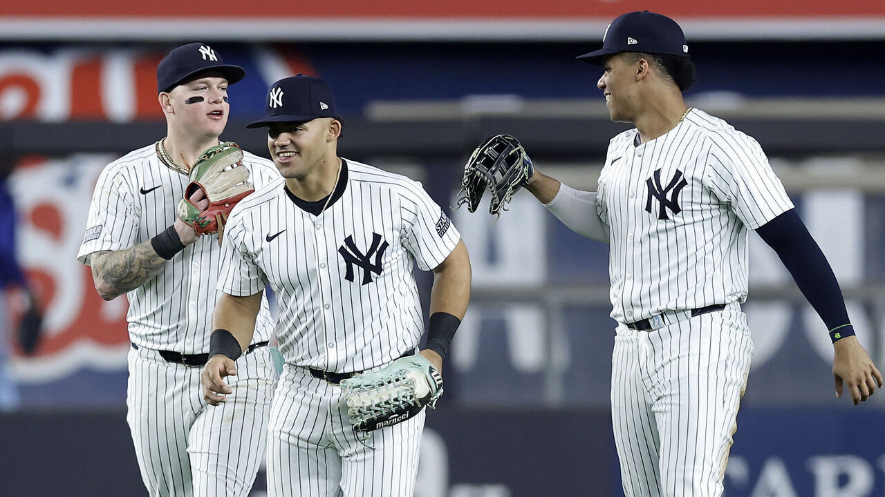 NEW YORK, NEW YORK - SEPTEMBER 09: (L-R) Alex Verdugo #24, Jasson Dominguez #89 and Juan Soto #22 of the New York Yankees celebrate after defeating the Kansas City Royals at Yankee Stadium on September 09, 2024 in New York City.