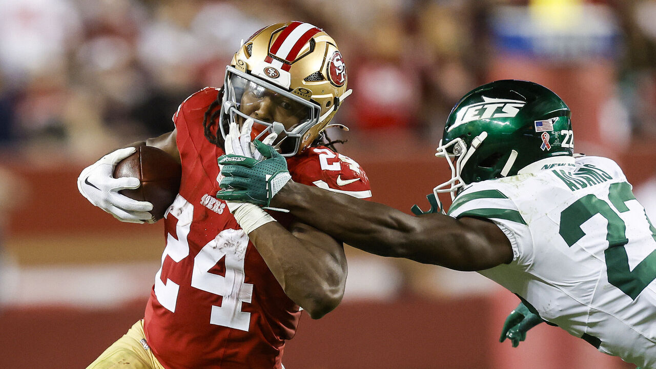 SANTA CLARA, CALIFORNIA - SEPTEMBER 09: Running back Jordan Mason #24 of the San Francisco 49ers runs for a first down against safety Tony Adams #22 of the New York Jets during the fourth quarter at Levi's Stadium on September 09, 2024 in Santa Clara, California.