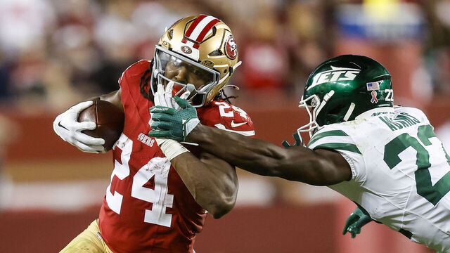 SANTA CLARA, CALIFORNIA - SEPTEMBER 09: Running back Jordan Mason #24 of the San Francisco 49ers runs for a first down against safety Tony Adams #22 of the New York Jets during the fourth quarter at Levi's Stadium on September 09, 2024 in Santa Clara, California.