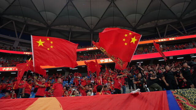 DALIAN, CHINA - SEPTEMBER 10: Fans of China cheer during the FIFA World Cup Asian 3rd Qualifier Group C match between China and Saudi Arabia at Dalian Barracuda Bay Professional Football Stadium on September 10, 2024 in Dalian, China.