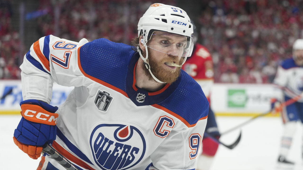 SUNRISE, FL - JUNE 24: Edmonton Oilers center Connor McDavid (97) collects a loose puck in the first period during game seven of the Stanley Cup Finals between the Edmonton Oilers and the Florida Panthers on Monday, June 24, 2024 at Amerant Bank Arena in Sunrise, Fla.