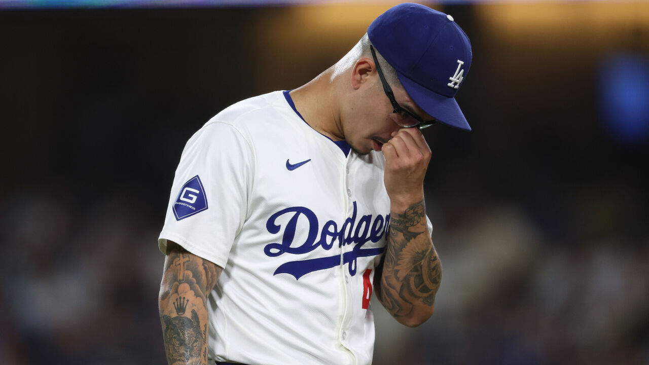 LOS ANGELES, CALIFORNIA - SEPTEMBER 06: Anthony Banda #43 of the Los Angeles Dodgers reacts as he leaves the mound at the end of the eighth inning giving up a solo home run to Brayan Rocchio #4 of the Cleveland Guardians, to trail 3-1, at Dodger Stadium on September 06, 2024 in Los Angeles, California.