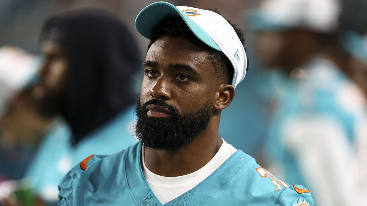 MIAMI GARDENS, FL - AUGUST 17: Raheem Mostert #31 of the Miami Dolphins stands on the sidelines during an NFL preseason football game against the Washington Commanders at Hard Rock Stadium on August 17, 2024 in Miami Gardens, FL.