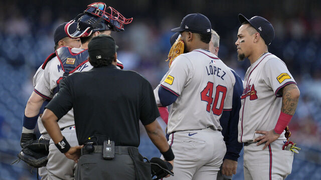 WASHINGTON, DC - SEPTEMBER 10: Reynaldo López #40 of the Atlanta Braves meets with teammates and training staff on the pitcher's mound during the first inning against the Washington Nationals at Nationals Park on September 10, 2024 in Washington, DC.