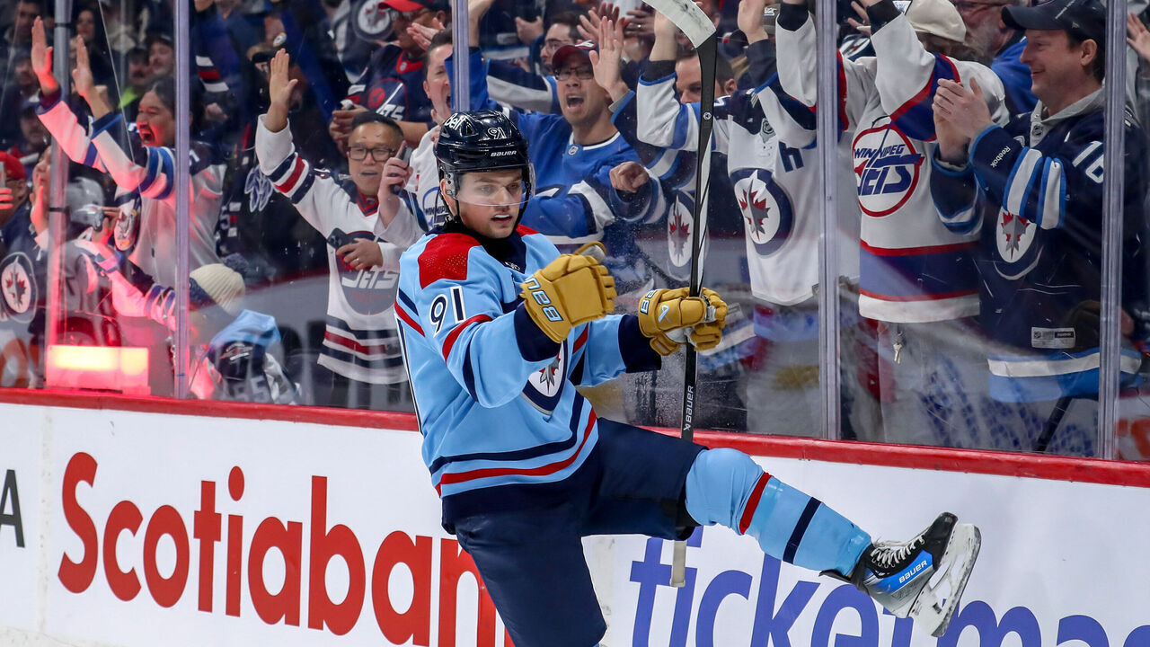 WINNIPEG, CANADA - APRIL 1: Cole Perfetti #91 of the Winnipeg Jets celebrates after scoring a first period goal against the Los Angeles Kings at the Canada Life Centre on April 1, 2024 in Winnipeg, Manitoba, Canada.