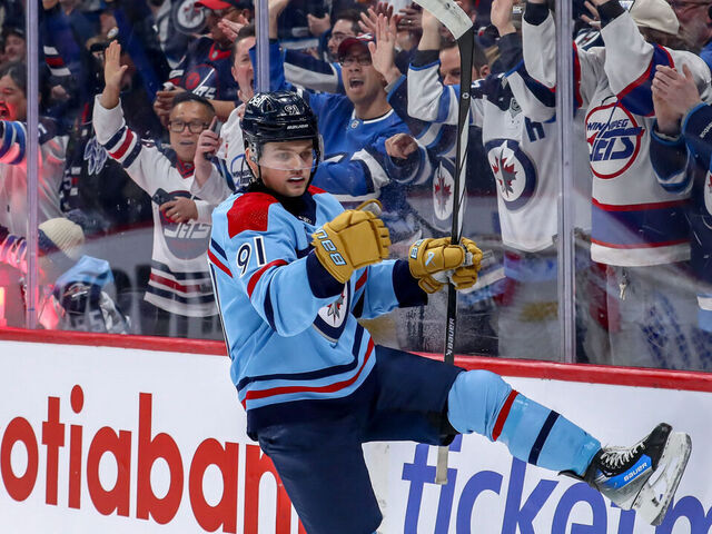 WINNIPEG, CANADA - APRIL 1: Cole Perfetti #91 of the Winnipeg Jets celebrates after scoring a first period goal against the Los Angeles Kings at the Canada Life Centre on April 1, 2024 in Winnipeg, Manitoba, Canada.