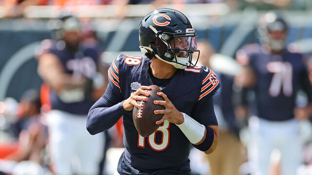 CHICAGO, ILLINOIS - SEPTEMBER 08: Caleb Williams #18 of the Chicago Bears looks to pass during a game against the Tennessee Titans at Soldier Field on September 08, 2024 in Chicago, Illinois. The Bears defeated the Titans 24-17.
