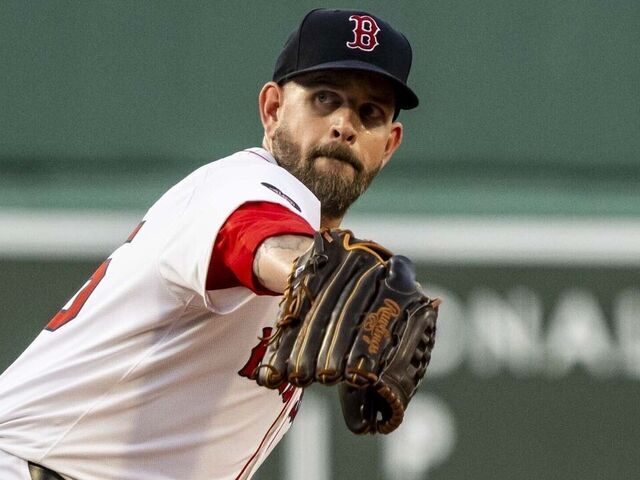 BOSTON, MA - JULY 30: James Paxton #65 of the Boston Red Sox delivers during the first inning of a game against the Seattle Mariners on July 30, 2024 at Fenway Park in Boston, Massachusetts.
