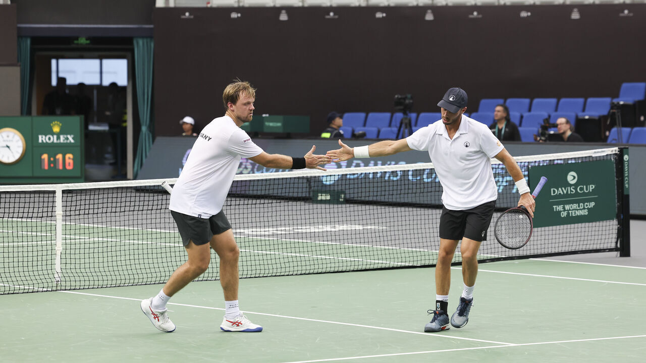 ZHUHAI, CHINA - SEPTEMBER 12: Kevin Krawietz (R) and Tim Puetz of Germany react during the 2024 Davis Cup Finals Group Stage against Tomas Barrios and Matias Soto of Chile at Hengqin International Tennis Center on September 12, 2024 in Zhuhai, China.