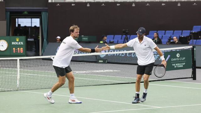 ZHUHAI, CHINA - SEPTEMBER 12: Kevin Krawietz (R) and Tim Puetz of Germany react during the 2024 Davis Cup Finals Group Stage against Tomas Barrios and Matias Soto of Chile at Hengqin International Tennis Center on September 12, 2024 in Zhuhai, China.