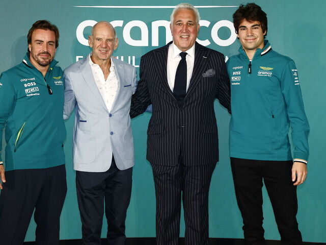 SILVERSTONE, ENGLAND - SEPTEMBER 10: Fernando Alonso, Aston Martin F1 Team, Adrian Newey, Lawrence Stroll, Owner, Aston Martin F1 Team, and Lance Stroll, Aston Martin F1 Team at a press conference at Aston Martin Headquarters on September 10, 2024 in Silverstone, England.