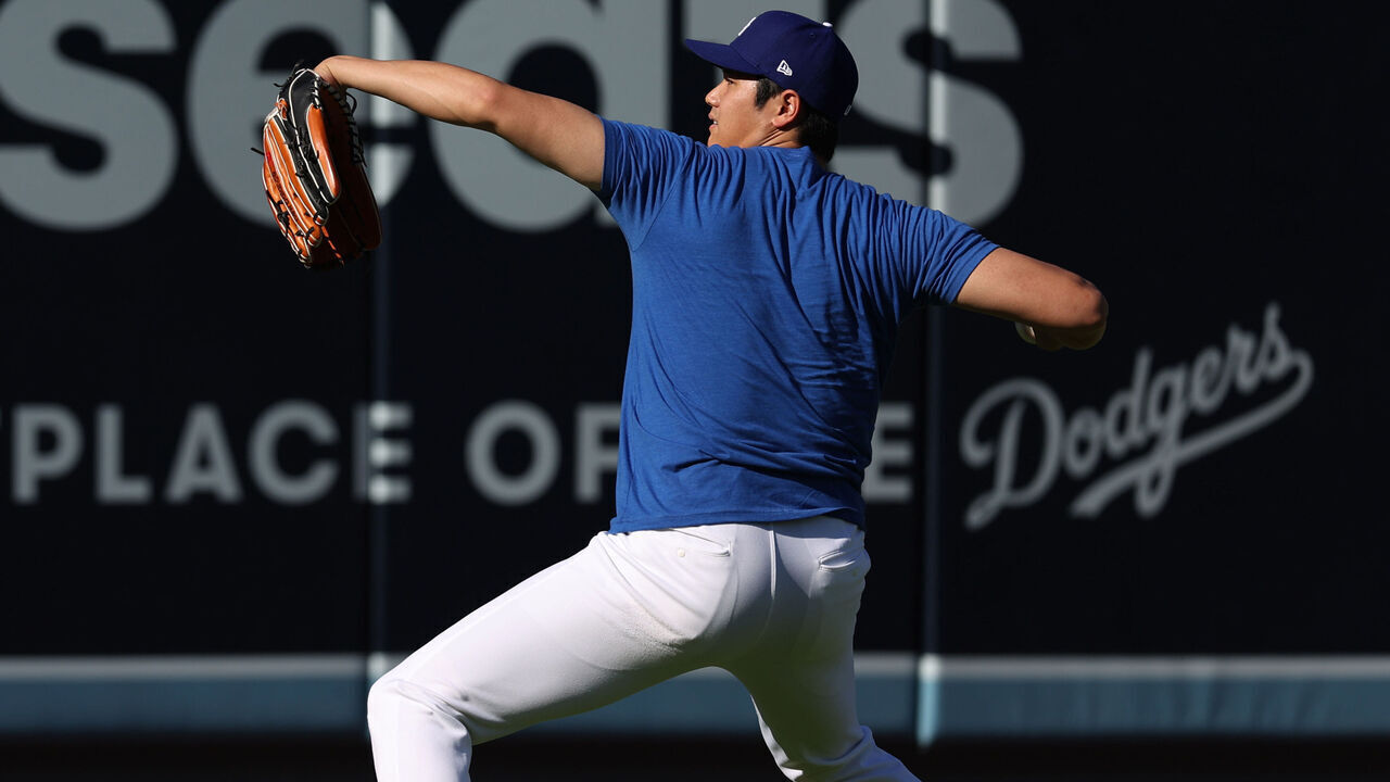 LOS ANGELES, CALIFORNIA - SEPTEMBER 10: Shohei Ohtani #17 of the Los Angeles Dodgers throws before the game against the Chicago Cubs at Dodger Stadium on September 10, 2024 in Los Angeles, California.