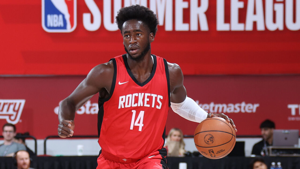 LAS VEGAS, NV - JULY 21: AJ Griffin #14 of the Houston Rockets dribbles the ball during the game against the Portland Trail Blazers on July 21, 2024 at the Cox Pavilion in Las Vegas, Nevada. Mandatory Copyright Notice: Copyright 2024 NBAE