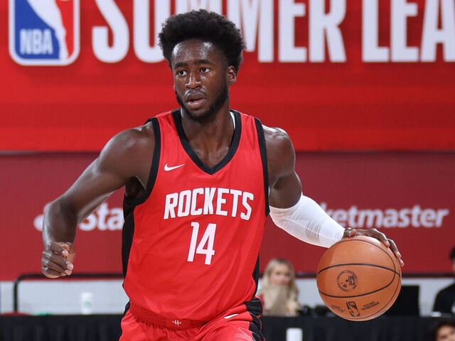 LAS VEGAS, NV - JULY 21: AJ Griffin #14 of the Houston Rockets dribbles the ball during the game against the Portland Trail Blazers on July 21, 2024 at the Cox Pavilion in Las Vegas, Nevada. Mandatory Copyright Notice: Copyright 2024 NBAE