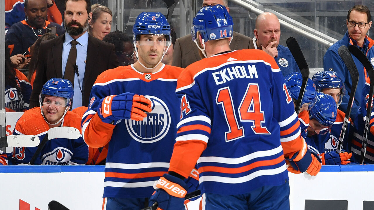 EDMONTON, CANADA - OCTOBER 21: Evan Bouchard #2 and Mattias Ekholm #14 of the Edmonton Oilers discuss the play during the game against the Winnipeg Jets at Rogers Place on October 21, 2023, in Edmonton, Alberta, Canada.