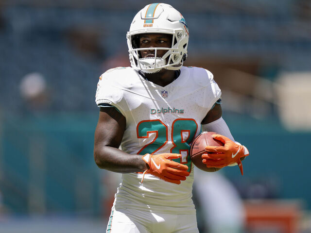 MIAMI GARDENS, FL - SEPTEMBER 08: Miami Dolphins running back De'Von Achane (28) looks on before the game between the Jacksonville Jaguars and the Miami Dolphins on September 8, 2024 at Hard Rock Stadium in Maimi Gardens, Fl.