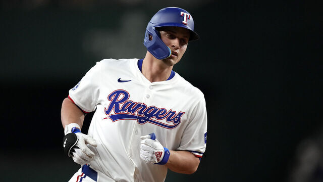 ARLINGTON, TEXAS - AUGUST 19: Corey Seager #5 of the Texas Rangers runs the bases on his solo home run during the first inning against the Pittsburgh Pirates at Globe Life Field on August 19, 2024 in Arlington, Texas.