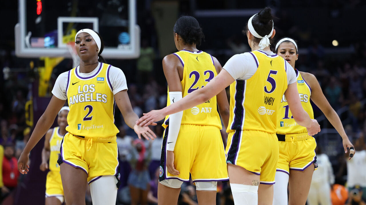 LOS ANGELES, CALIFORNIA - JULY 07: Rickea Jackson #2 of the Los Angeles Sparks reacts with teammates on the court during a timeout in the second half of a game against the Phoenix Mercury at Crypto.com Arena on July 07, 2024 in Los Angeles, California.
