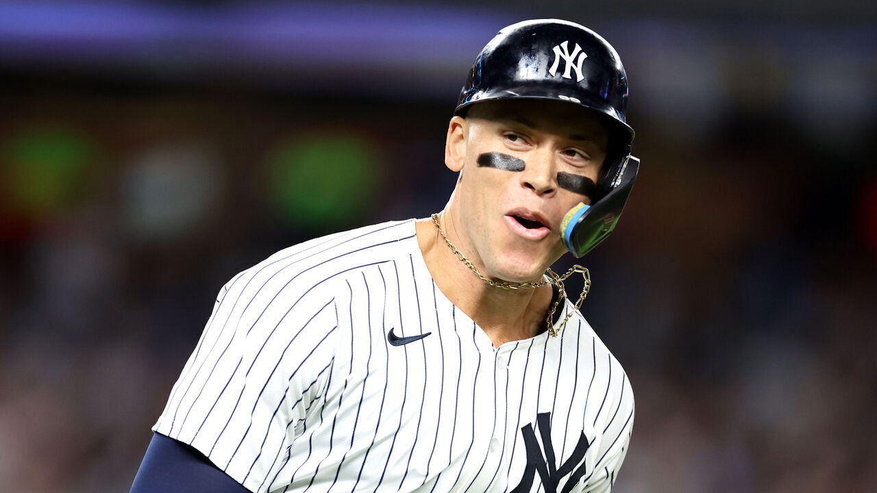 NEW YORK, NEW YORK - SEPTEMBER 13: Aaron Judge #99 of the New York Yankees reacts after a grand slam against the Boston Red Sox during the seventh inning at Yankee Stadium on September 13, 2024 in the Bronx borough of New York City.