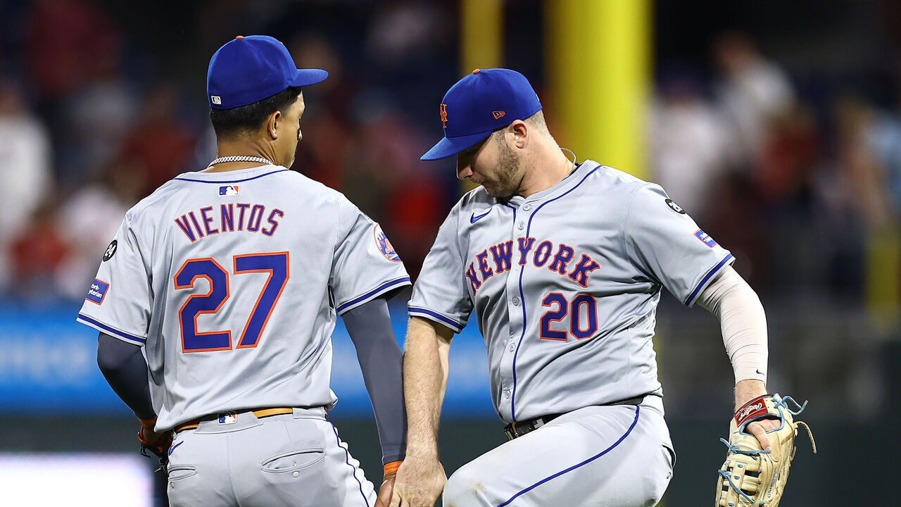 PHILADELPHIA, PENNSYLVANIA - SEPTEMBER 13: Mark Vientos #27 and Pete Alonso #20 of the New York Mets react after defeating the Philadelphia Phillies at Citizens Bank Park on September 13, 2024 in Philadelphia, Pennsylvania.