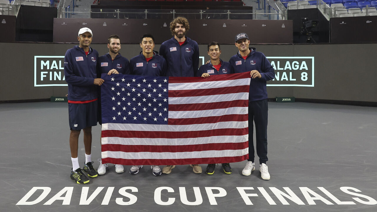 ZHUHAI, CHINA - SEPTEMBER 14: (L-R) Rajeev Ram, Austin Krajicek, Brandon Nakashima, Reilly Opelka, Mackenzie Mcdonald and Bob Bryan of the United States team celebrate Road to Malaga in the final the 2024 Davis Cup Finals Group Stage match between Germany and the United States at Hengqin International Tennis Center on September 14, 2024 in Zhuhai, China.