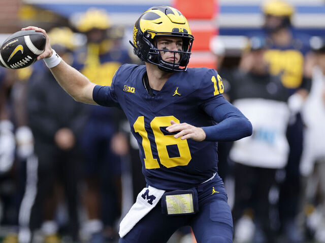 ANN ARBOR, MI - SEPTEMBER 07: Michigan Wolverines quarterback Davis Warren (16) passes the ball during a college football game against the Texas Longhorns on September 07, 2024 at Michigan Stadium in Ann Arbor, Michigan.