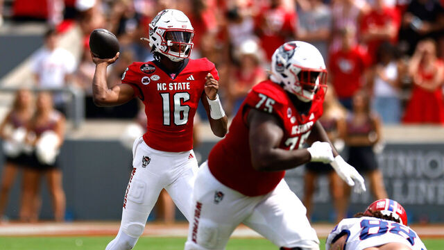 RALEIGH, NORTH CAROLINA - SEPTEMBER 14: CJ Bailey #16 of the NC State Wolfpack drops back to pass against the Louisiana Tech Bulldogs during the second half of the game at Carter-Finley Stadium on September 14, 2024 in Raleigh, North Carolina.