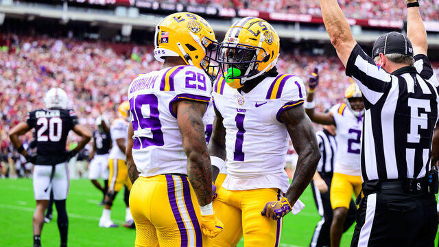 COLUMBIA, SOUTH CAROLINA - SEPTEMBER 14: Aaron Anderson #1 and Caden Durham #29 of the LSU Tigers celebrate a touchdown during the second quarter of the game at Williams-Brice Stadium on September 14, 2024 in Columbia, South Carolina.