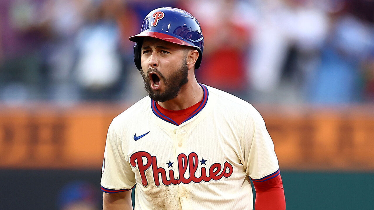 PHILADELPHIA, PENNSYLVANIA - SEPTEMBER 14: Cal Stevenson #47 of the Philadelphia Phillies reacts after hitting a 2-RBI double during the seventh inning against the New York Mets at Citizens Bank Park on September 14, 2024 in Philadelphia, Pennsylvania.