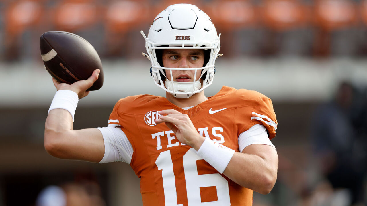 AUSTIN, TEXAS - SEPTEMBER 14: Arch Manning #16 of the Texas Longhorns warms up before the game against the UTSA Roadrunners at Darrell K Royal-Texas Memorial Stadium on September 14, 2024 in Austin, Texas.