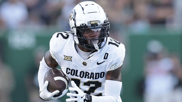 FORT COLLINS, COLORADO - SEPTEMBER 14: Travis Hunter #12 of the Colorado Buffaloes runs with the ball during the first quarter against the Colorado State Rams at Canvas Stadium on September 14, 2024 in Fort Collins, Colorado.
