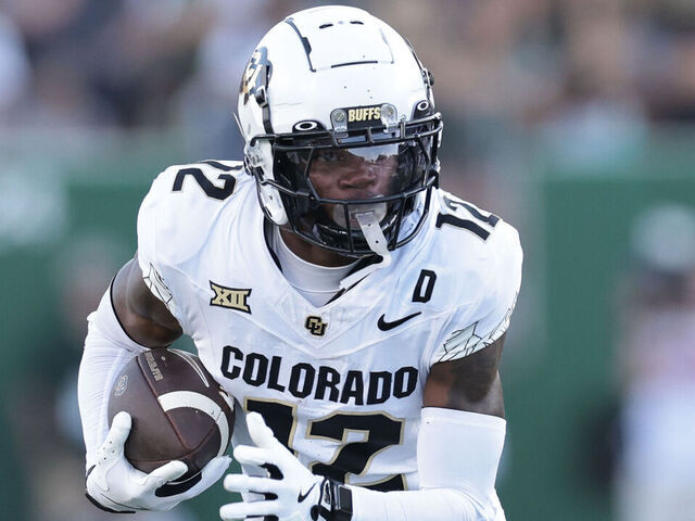 FORT COLLINS, COLORADO - SEPTEMBER 14: Travis Hunter #12 of the Colorado Buffaloes runs with the ball during the first quarter against the Colorado State Rams at Canvas Stadium on September 14, 2024 in Fort Collins, Colorado.