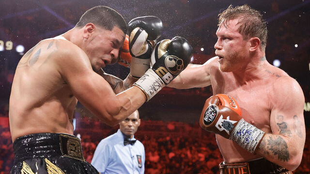 LAS VEGAS, NEVADA - SEPTEMBER 14: WBC/WBA/WBO super middleweight champion Canelo Alvarez (R) punches Edgar Berlanga during the ninth round of a title fight at T-Mobile Arena on September 14, 2024 in Las Vegas, Nevada.