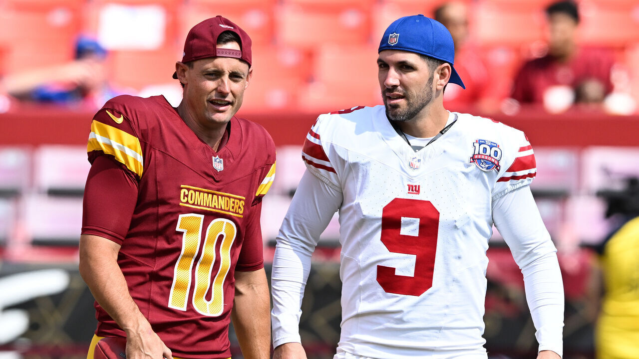 LANDOVER, MARYLAND - SEPTEMBER 15: Tress Way #10 of the Washington Commanders and Graham Gano #9 of the New York Giants talk prior to a game at Northwest Stadium on September 15, 2024 in Landover, Maryland.