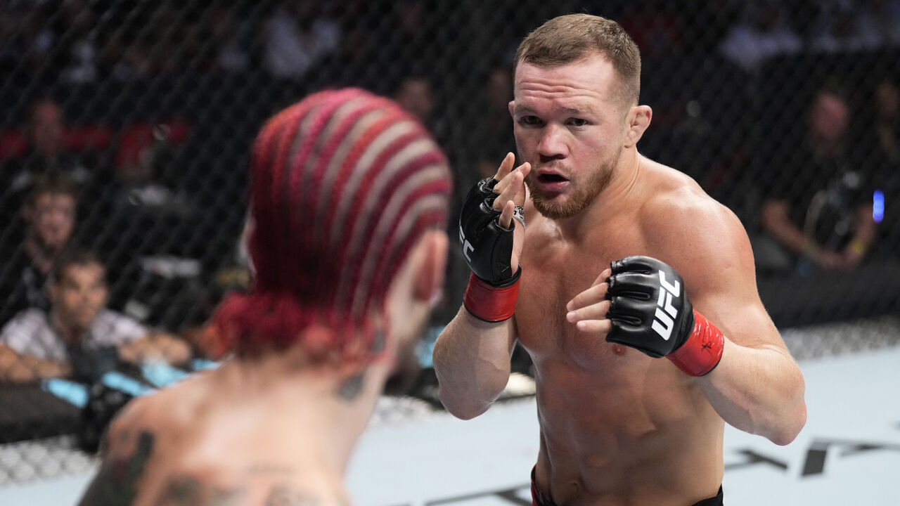 ABU DHABI, UNITED ARAB EMIRATES - OCTOBER 22: (R-L) Petr Yan of Russia battles Sean O'Malley in a bantamweight fight during the UFC 280 event at Etihad Arena on October 22, 2022 in Abu Dhabi, United Arab Emirates.