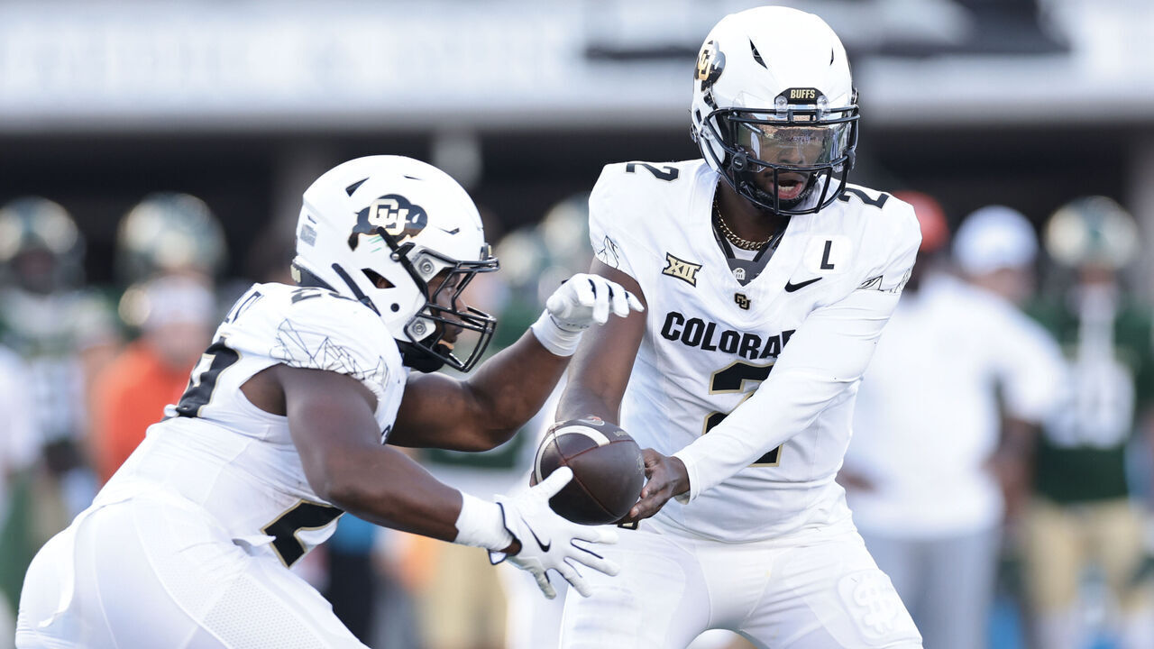 FORT COLLINS, COLORADO - SEPTEMBER 14: Shedeur Sanders #2 of the Colorado Buffaloes hands off the ball during the first quarter against the Colorado State Rams at Canvas Stadium on September 14, 2024 in Fort Collins, Colorado.