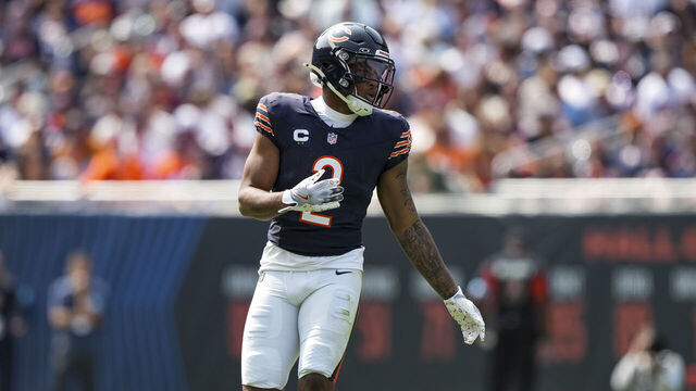 CHICAGO, IL - SEPTEMBER 8: Wide receiver DJ Moore #2 of the Chicago Bears gets set during the first quarter of an NFL football game against the Tennessee Titans, at Soldier Field on September 8, 2024 in Chicago, Illinois.