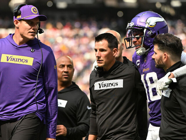MINNEAPOLIS, MINNESOTA - SEPTEMBER 15: Justin Jefferson #18 of the Minnesota Vikings is helped off the field against the San Francisco 49ers during the third quarter at U.S. Bank Stadium on September 15, 2024 in Minneapolis, Minnesota.