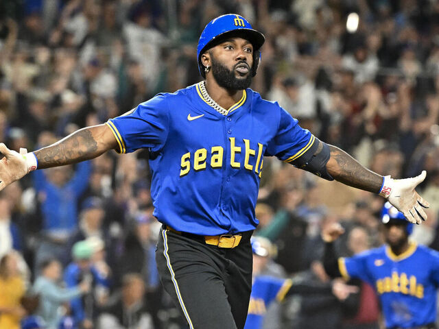 SEATTLE, WASHINGTON - SEPTEMBER 14: Randy Arozarena #56 of the Seattle Mariners hits a walk-off single during the ninth inning to win the game against the Texas Rangers at T-Mobile Park on September 14, 2024 in Seattle, Washington. The Seattle Mariners won 5-4.