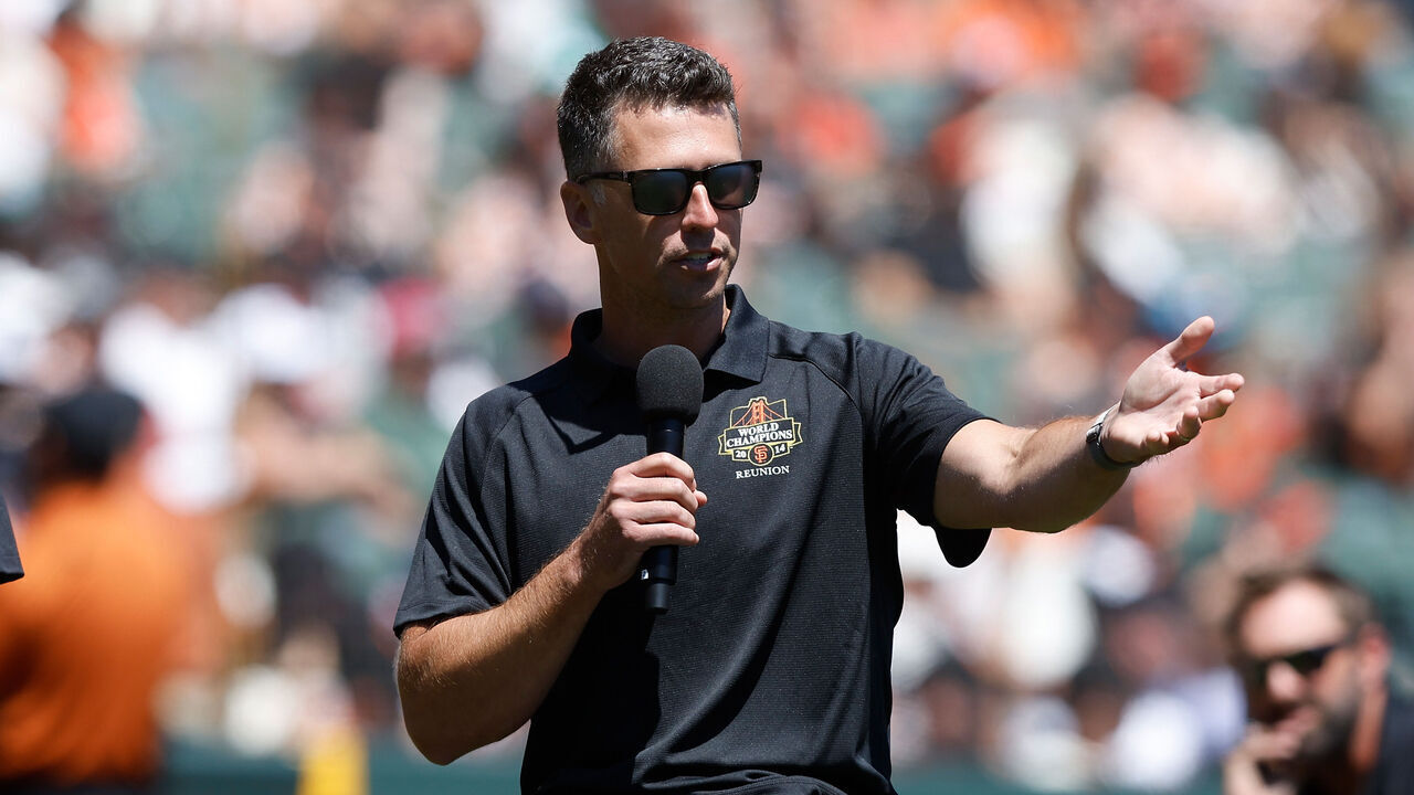 SAN FRANCISCO, CALIFORNIA - AUGUST 10: Former San Francisco Giants player Buster Posey addresses the crowd during the 2014 World Series Reunion ceremony before the game between the San Francisco Giants and the Detroit Tigers at Oracle Park on August 10, 2024 in San Francisco, California.