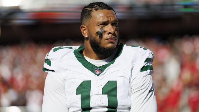 SANTA CLARA, CA - SEPTEMBER 9: Linebacker Jermaine Johnson #11 of the New York Jets stands on the sidelines during the national anthem prior to an NFL football game against the San Francisco 49ers, at Levi's Stadium on September 9, 2024 in Santa Clara, California.