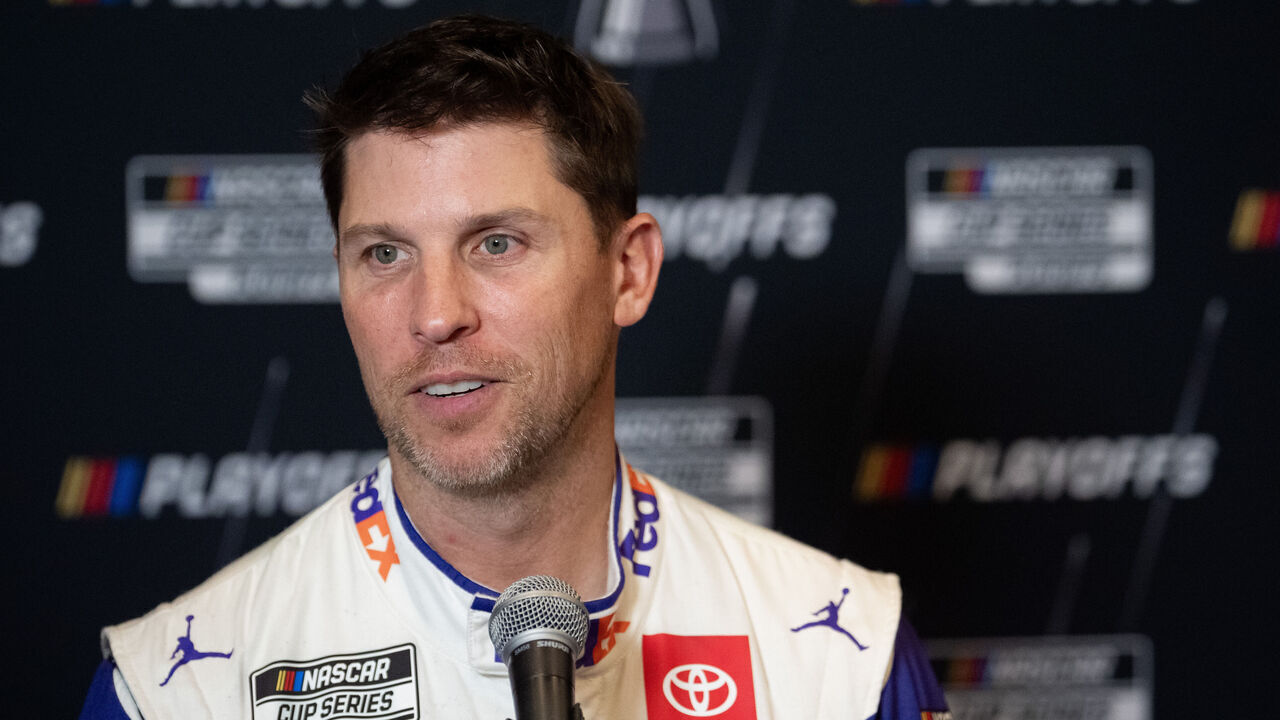CHARLOTTE, NORTH CAROLINA - SEPTEMBER 04: Denny Hamlin speaks with the media during NASCAR Cup Series Playoff Media Day at the Charlotte Convention Center on September 04, 2024 in Charlotte, North Carolina.