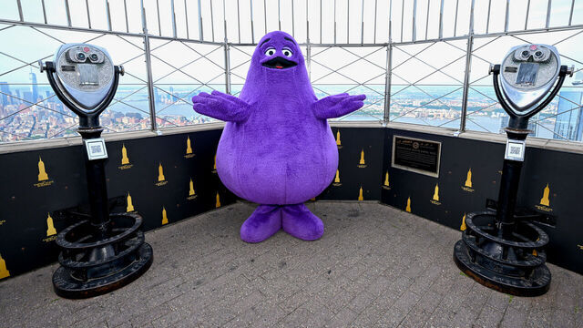 NEW YORK, NEW YORK - JUNE 26: Grimace Celebrates Birthday at The Empire State Building on June 26, 2024 in New York City.