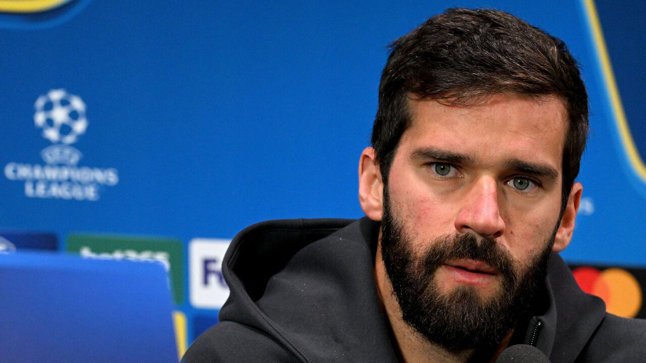Liverpool's Brazilian goalkeeper #01 Alisson Becker attends a press conference on the eve of the UEFA Champions League football match between AC Milan and Liverpool, at the San Siro stadium in Milan on September 16, 2024.