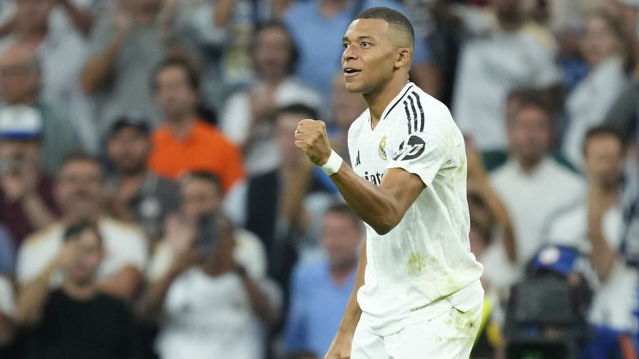 Kylian Mbappe centre-forward of Real Madrid and France celebrates after scoring his sides first goal during the UEFA Champions League 2024/25 League Phase MD1 match between Real Madrid C.F. and VfB Stuttgart at Estadio Santiago Bernabeu on September 17, 2024 in Madrid, Spain.