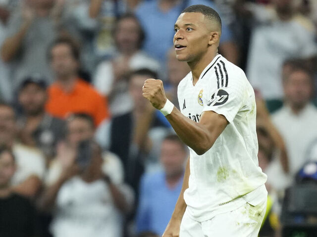 Kylian Mbappe centre-forward of Real Madrid and France celebrates after scoring his sides first goal during the UEFA Champions League 2024/25 League Phase MD1 match between Real Madrid C.F. and VfB Stuttgart at Estadio Santiago Bernabeu on September 17, 2024 in Madrid, Spain.