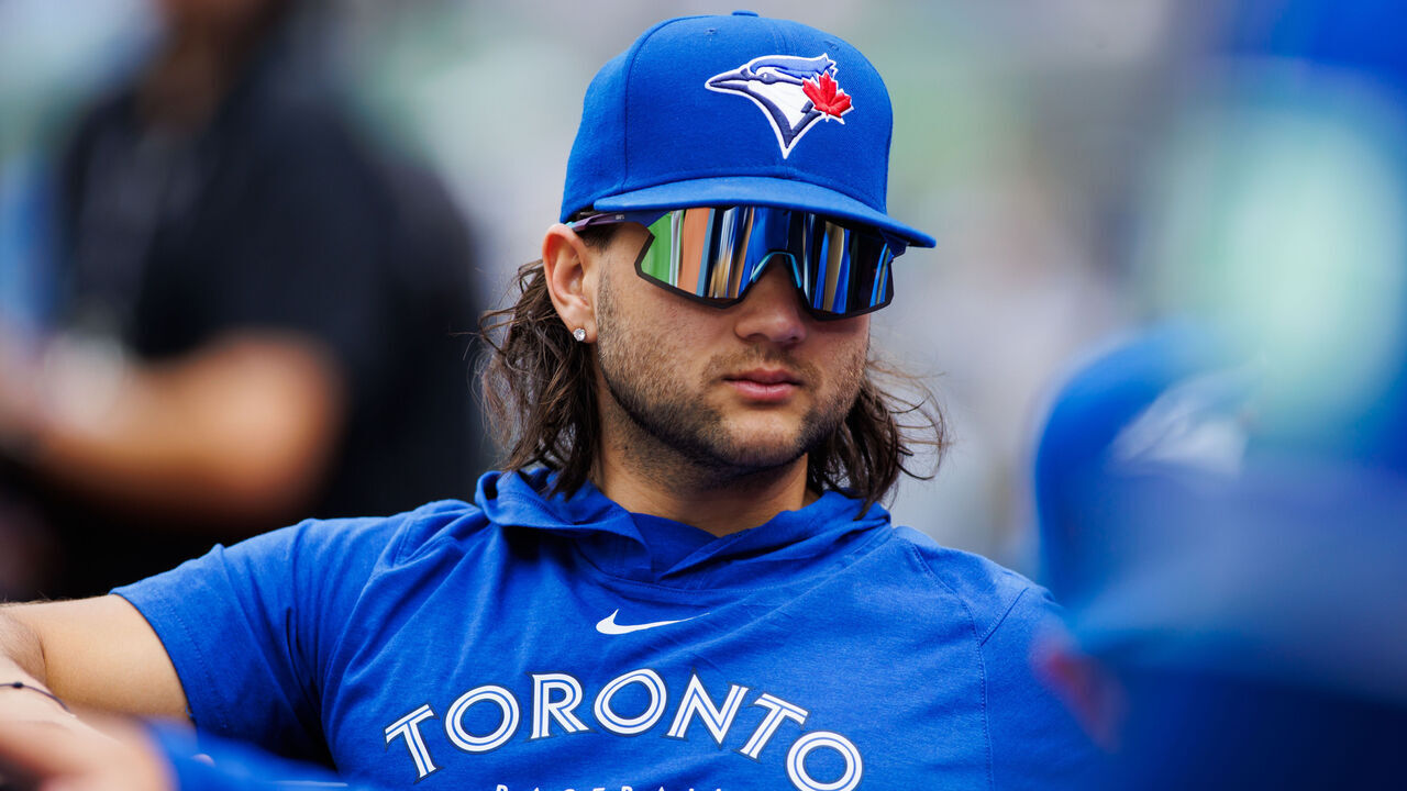 TORONTO, CANADA - AUGUST 10: Currently on the IL, Bo Bichette #11 of the Toronto Blue Jays sits in the dugout during their MLB game against the Oakland Athletics at Rogers Centre on August 10, 2024 in Toronto, Ontario, Canada.